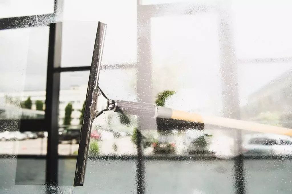 How oftens should you clean your windows blog image of a window being cleaned